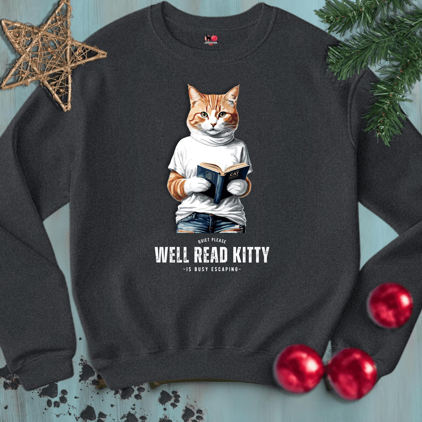 Printify Sweatshirt S / Dark Heather WELL-READ-KITTY-BLACK-CATSONAS-READING_e114af6c-26d9-44c9-91a8-b139911a2da8