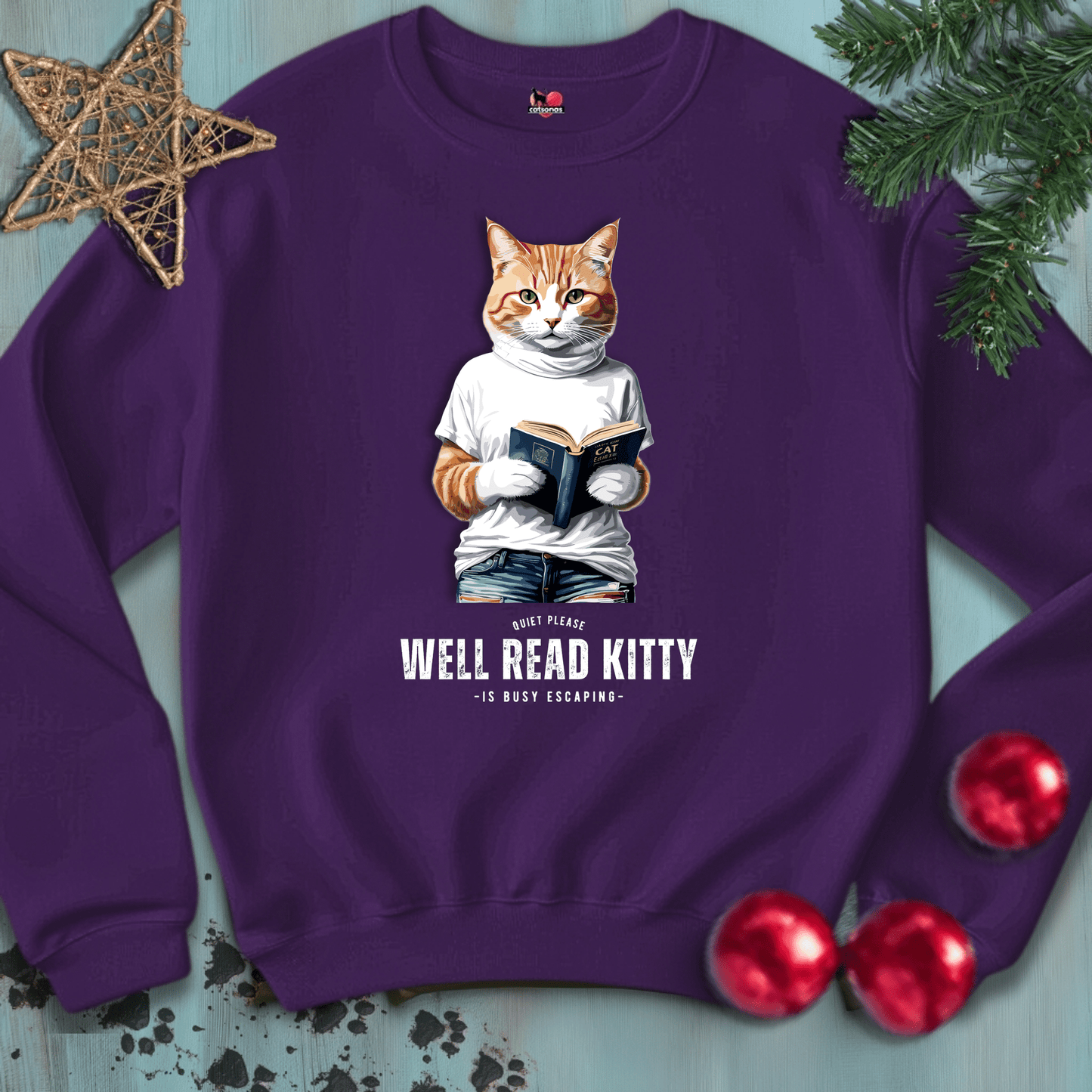 Printify Sweatshirt S / Purple WELL-READ-KITTY-BLACK-CATSONAS-READING_e114af6c-26d9-44c9-91a8-b139911a2da8